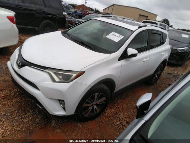 Photo 1 VIN: 2T3WFREV2GW311615 - TOYOTA RAV4 