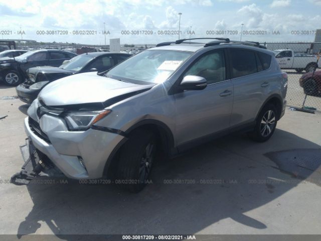 Photo 1 VIN: 2T3WFREV2JW437593 - TOYOTA RAV4 