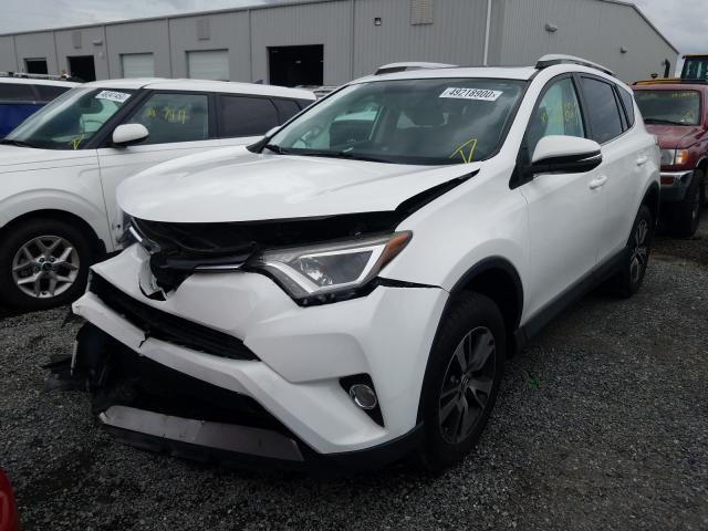 Photo 1 VIN: 2T3WFREV3GW254292 - TOYOTA RAV4 XLE 