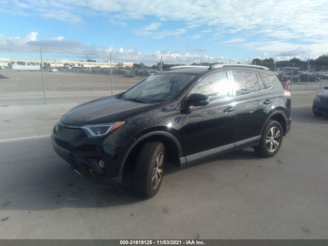 Photo 1 VIN: 2T3WFREV3JW519896 - TOYOTA RAV4 