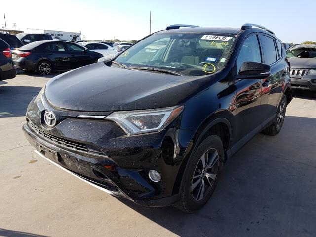 Photo 1 VIN: 2T3WFREV4GW251031 - TOYOTA RAV4 XLE 