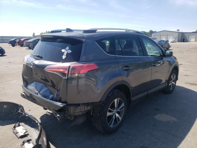 Photo 3 VIN: 2T3WFREV4GW255595 - TOYOTA RAV4 XLE 