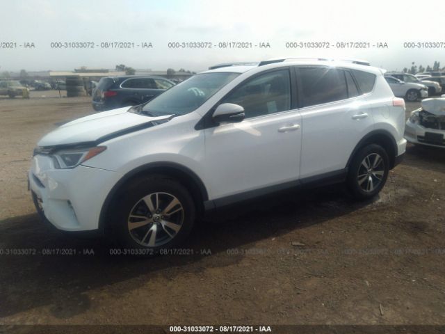 Photo 1 VIN: 2T3WFREV4GW280206 - TOYOTA RAV4 