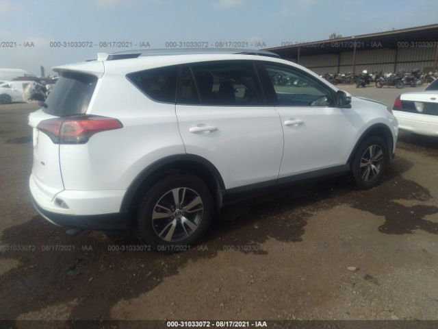 Photo 3 VIN: 2T3WFREV4GW280206 - TOYOTA RAV4 