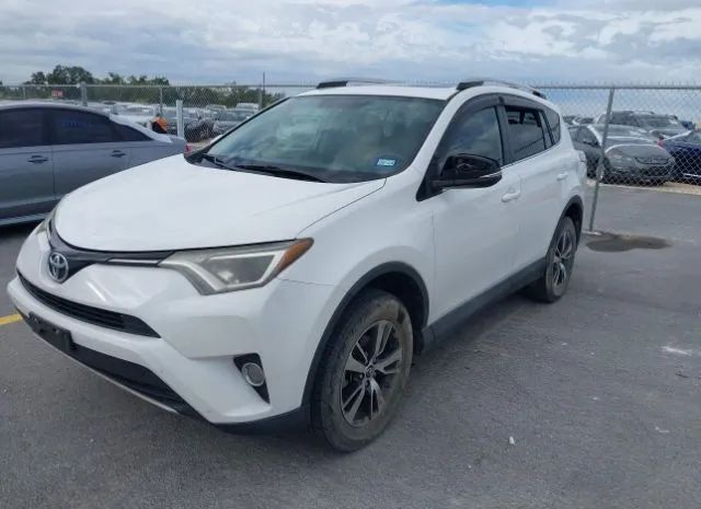 Photo 1 VIN: 2T3WFREV4GW283381 - TOYOTA RAV4 