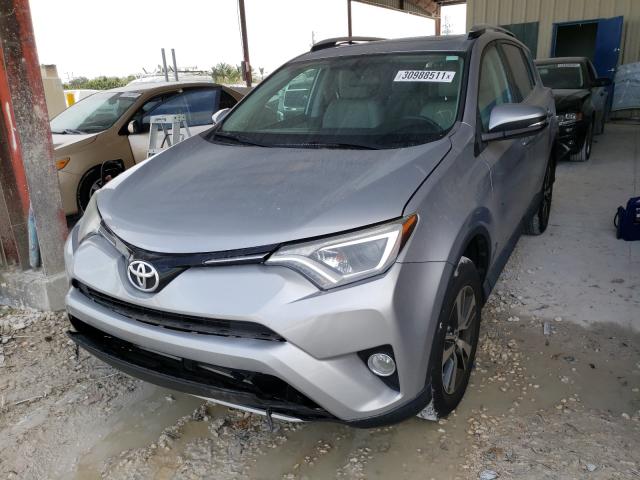 Photo 1 VIN: 2T3WFREV4GW285065 - TOYOTA RAV4 XLE 