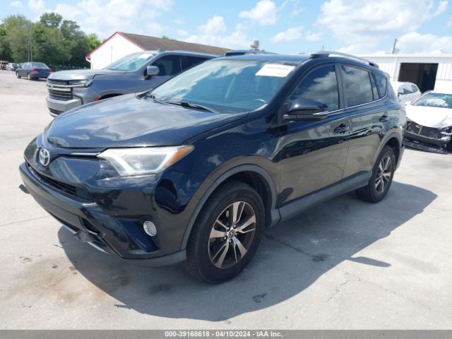 Photo 1 VIN: 2T3WFREV4GW294428 - TOYOTA RAV4 