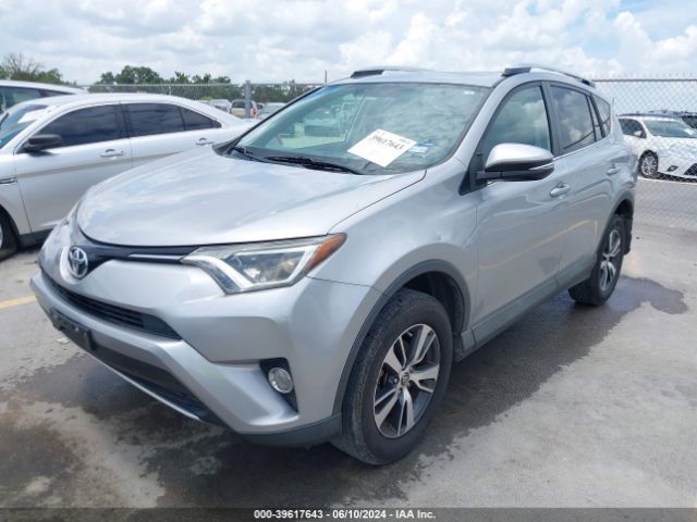 Photo 1 VIN: 2T3WFREV4GW299726 - TOYOTA RAV4 