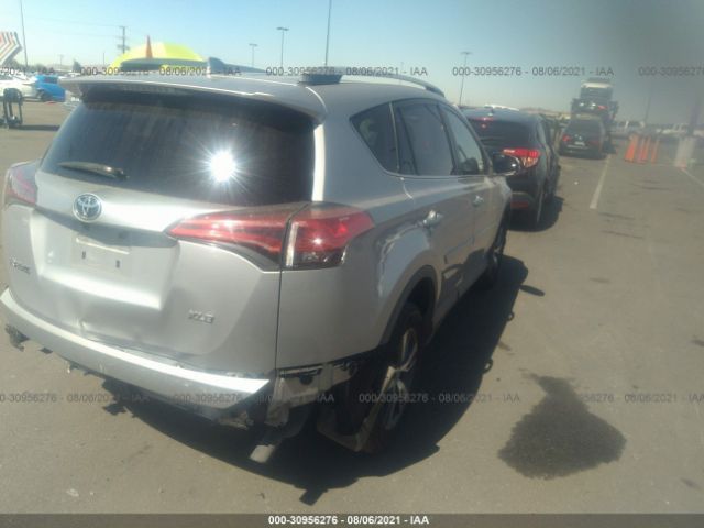 Photo 3 VIN: 2T3WFREV6GW255162 - TOYOTA RAV4 