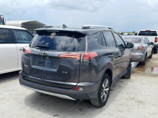 Photo 3 VIN: 2T3WFREV6GW258000 - TOYOTA RAV4 XLE 