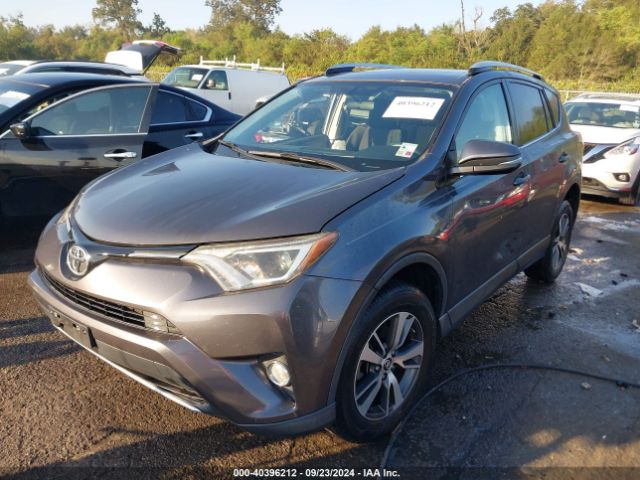 Photo 1 VIN: 2T3WFREV6GW297959 - TOYOTA RAV4 