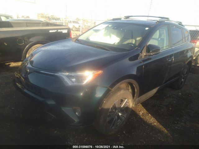 Photo 1 VIN: 2T3WFREV6JW473125 - TOYOTA RAV4 