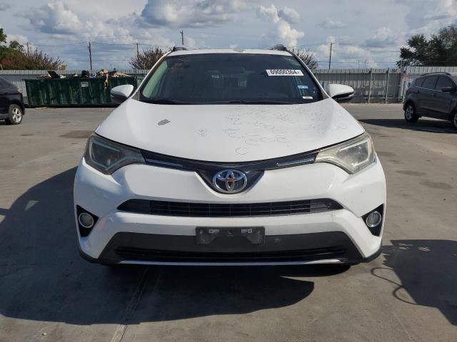 Photo 4 VIN: 2T3WFREV7GW242713 - TOYOTA RAV4 XLE 