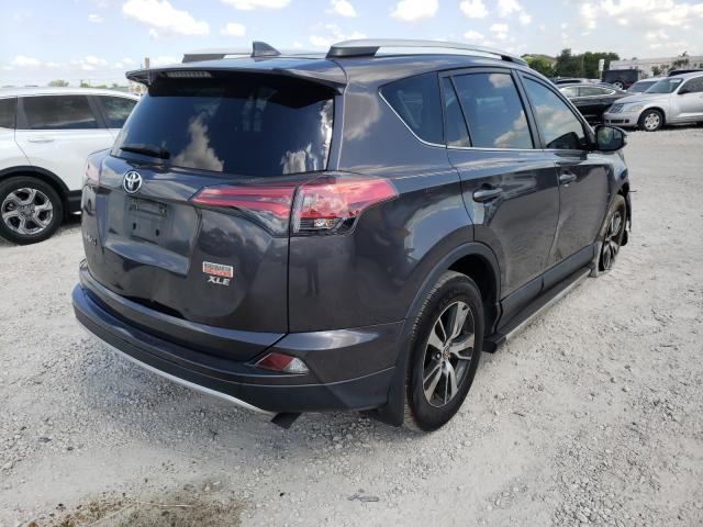 Photo 3 VIN: 2T3WFREV7GW287456 - TOYOTA RAV4 XLE 