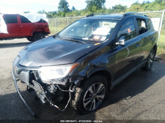 Photo 1 VIN: 2T3WFREV7JW410745 - TOYOTA RAV4 