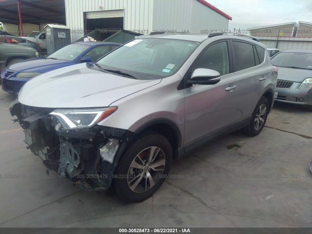 Photo 1 VIN: 2T3WFREV7JW412379 - TOYOTA RAV4 