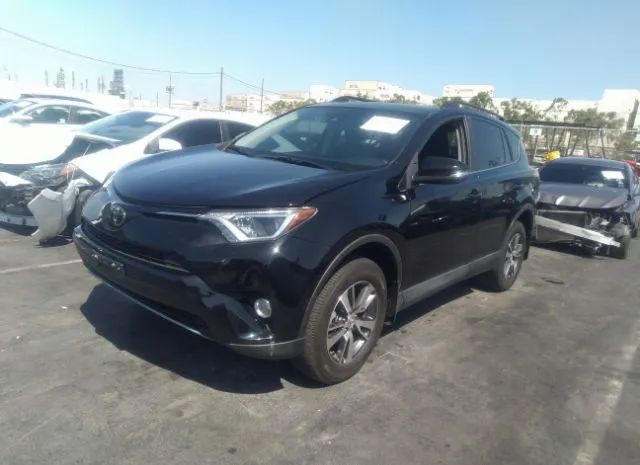 Photo 1 VIN: 2T3WFREV7JW513079 - TOYOTA RAV4 