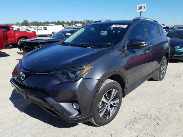 Photo 1 VIN: 2T3WFREV7JW517987 - TOYOTA RAV4 