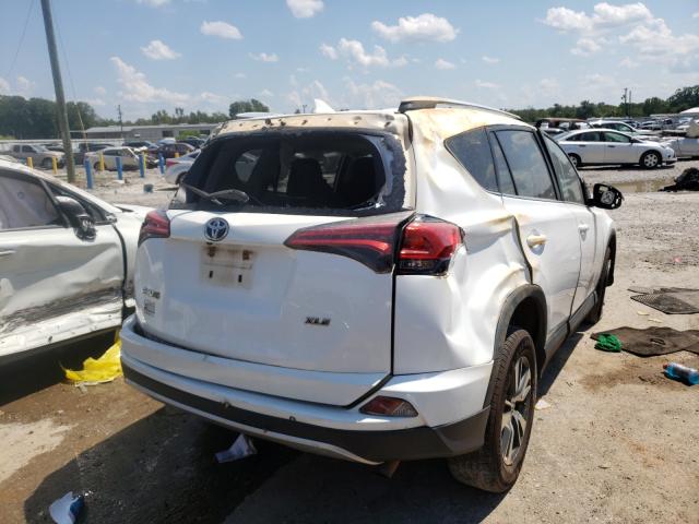 Photo 3 VIN: 2T3WFREV8GW254031 - TOYOTA RAV4 XLE 