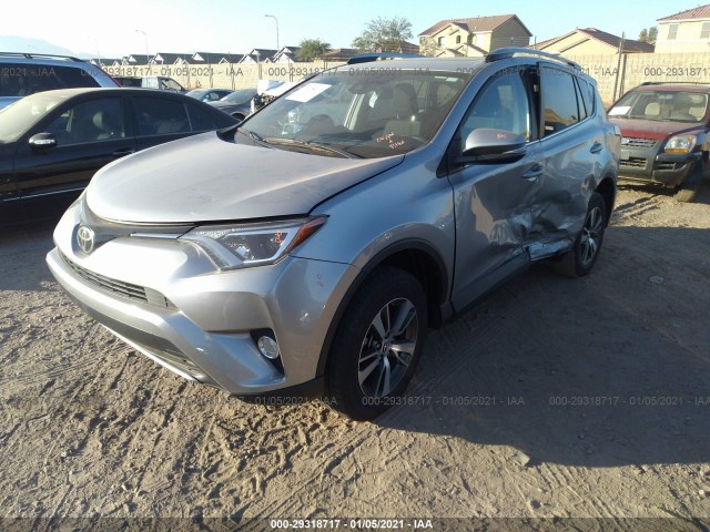 Photo 1 VIN: 2T3WFREV8JW408700 - TOYOTA RAV4 