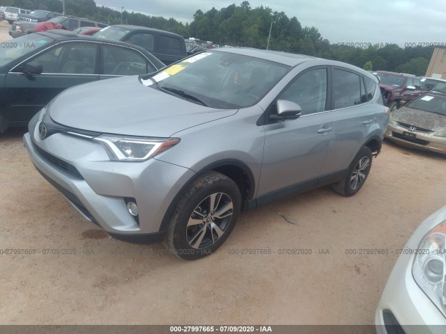 Photo 1 VIN: 2T3WFREV8JW467701 - TOYOTA RAV4 