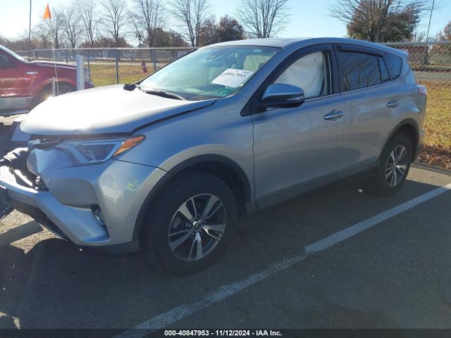 Photo 1 VIN: 2T3WFREV8JW477449 - TOYOTA RAV4 