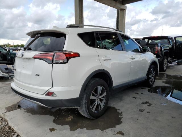 Photo 2 VIN: 2T3WFREV9GW300725 - TOYOTA RAV4 XLE 