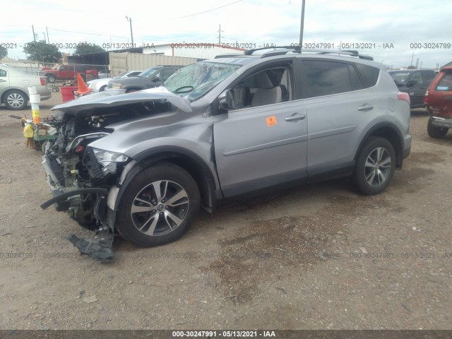 Photo 1 VIN: 2T3WFREV9JW418572 - TOYOTA RAV4 