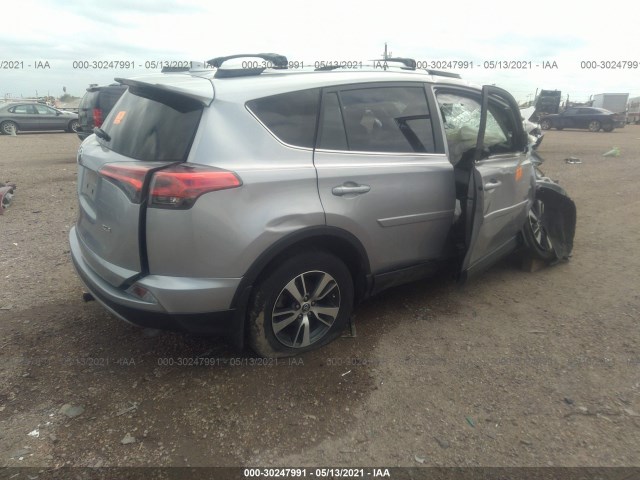 Photo 3 VIN: 2T3WFREV9JW418572 - TOYOTA RAV4 