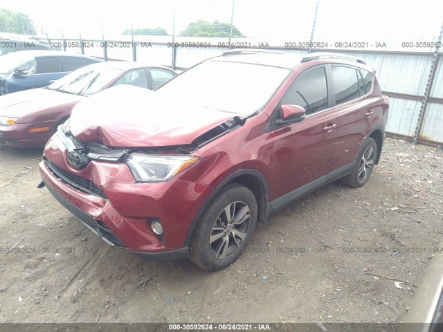 Photo 1 VIN: 2T3WFREV9JW490467 - TOYOTA RAV4 