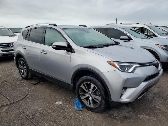 Photo 3 VIN: 2T3WFREVXGW297415 - TOYOTA RAV4 XLE 