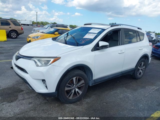 Photo 1 VIN: 2T3WFREVXJW410318 - TOYOTA RAV4 