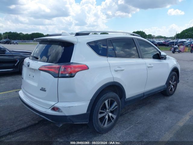 Photo 3 VIN: 2T3WFREVXJW410318 - TOYOTA RAV4 