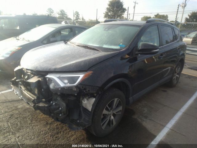 Photo 1 VIN: 2T3WFREVXJW449717 - TOYOTA RAV4 