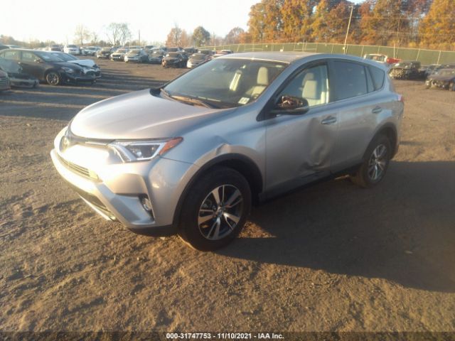 Photo 1 VIN: 2T3WFREVXJW479056 - TOYOTA RAV4 