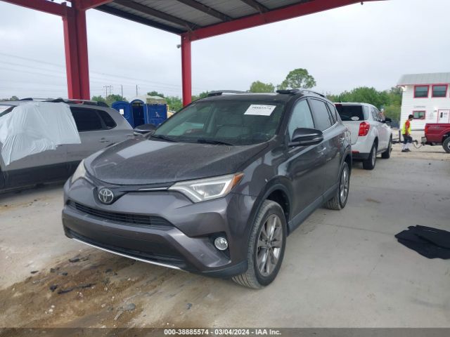 Photo 1 VIN: 2T3YFREV0GW271690 - TOYOTA RAV4 