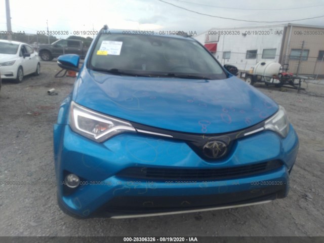 Photo 5 VIN: 2T3YFREV4GW297502 - TOYOTA RAV4 