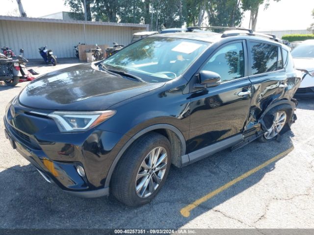 Photo 1 VIN: 2T3YFREV6GW295413 - TOYOTA RAV4 