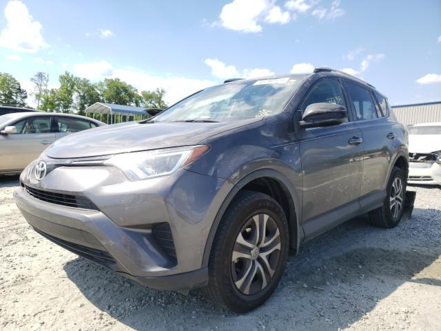 Photo 1 VIN: 2T3ZFREV0GW290258 - TOYOTA RAV4 LE 