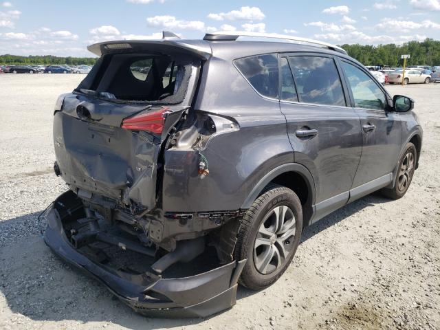 Photo 3 VIN: 2T3ZFREV0GW290258 - TOYOTA RAV4 LE 