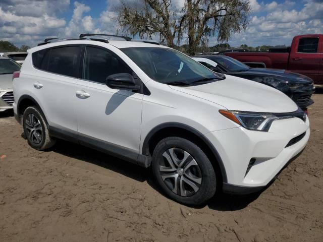 Photo 3 VIN: 2T3ZFREV1GW250870 - TOYOTA RAV4 LE 