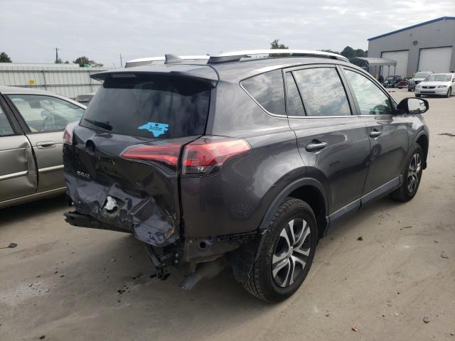 Photo 3 VIN: 2T3ZFREV1GW306869 - TOYOTA RAV4 LE 