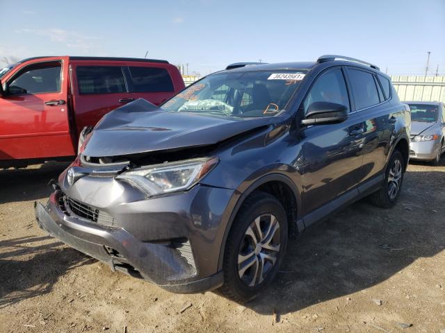 Photo 1 VIN: 2T3ZFREV2GW246391 - TOYOTA RAV4 LE 