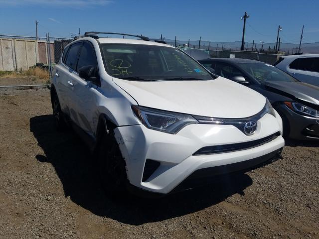 Photo 0 VIN: 2T3ZFREV2GW282016 - TOYOTA RAV4 LE 