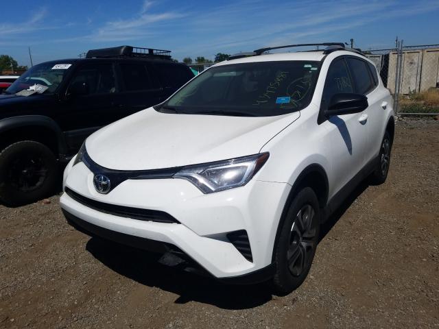 Photo 1 VIN: 2T3ZFREV2GW282016 - TOYOTA RAV4 LE 