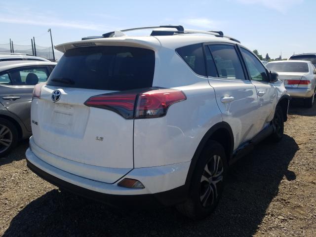 Photo 3 VIN: 2T3ZFREV2GW282016 - TOYOTA RAV4 LE 