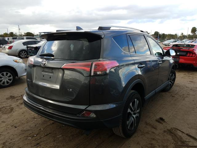 Photo 3 VIN: 2T3ZFREV2GW293047 - TOYOTA RAV4 LE 