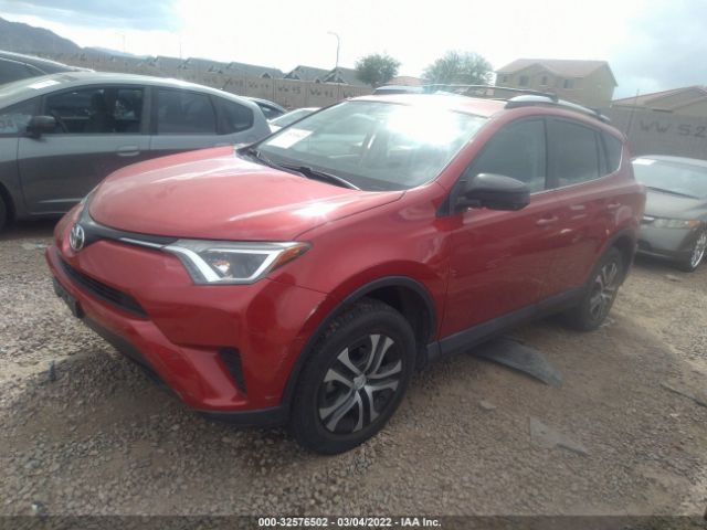 Photo 1 VIN: 2T3ZFREV2GW295512 - TOYOTA RAV4 