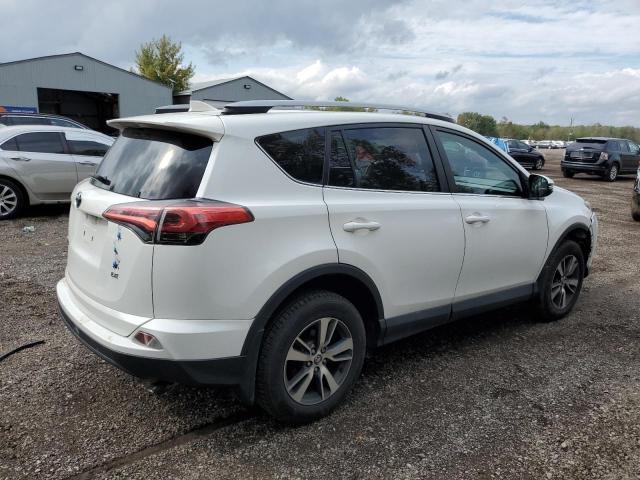 Photo 2 VIN: 2T3ZFREV2JW422752 - TOYOTA RAV4 LE 