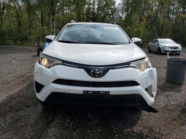 Photo 4 VIN: 2T3ZFREV2JW422752 - TOYOTA RAV4 LE 